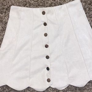 cream skirt with gold buttons